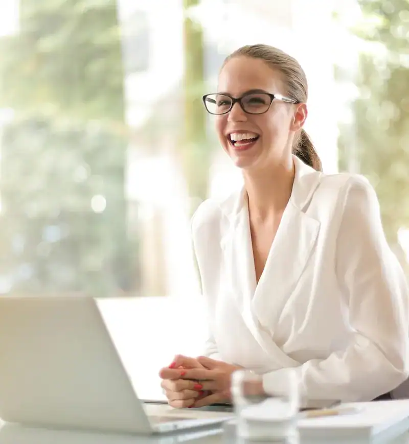 confident woman sitting at desk