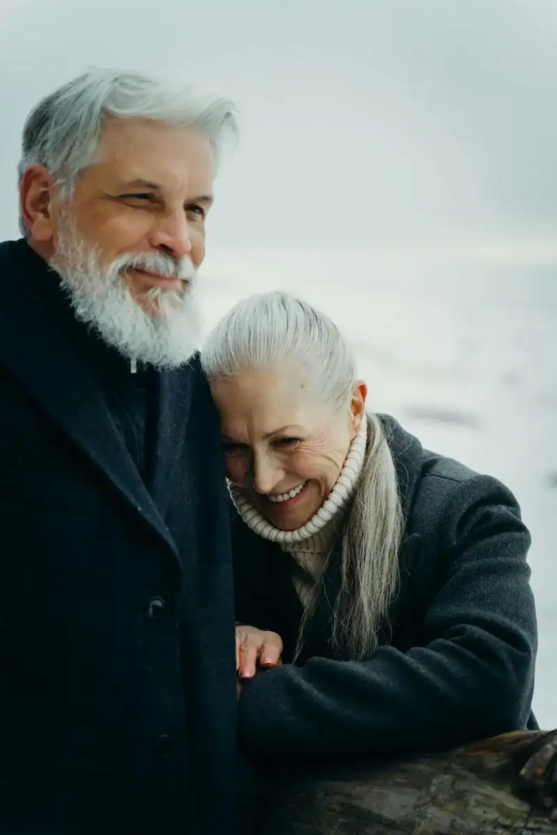 couple outdoors smiling together