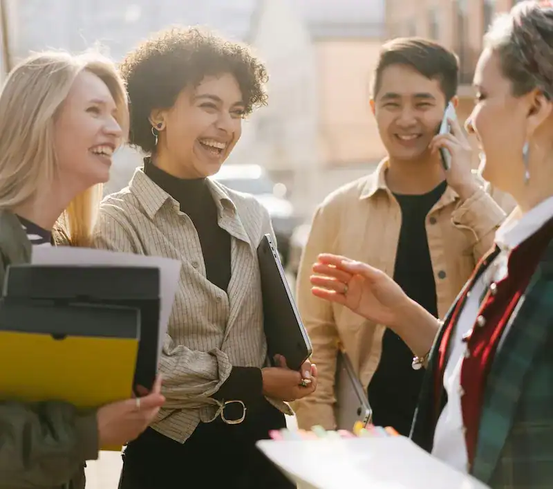 work colleagues laughing together